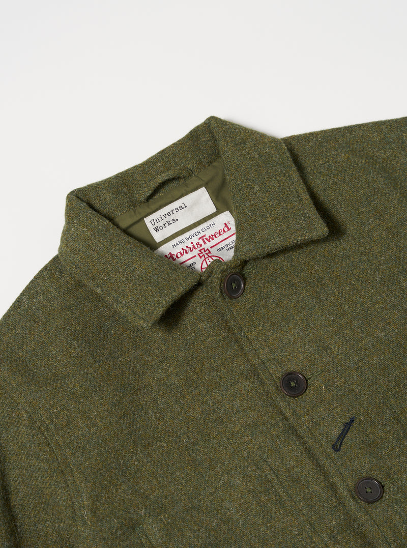 Close-up of the Green Harris Tweed Plaid Bakers Jacket on a white background. Shows the texture of the green tweed, buttons, and Harris Tweed label.