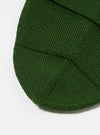 Close-up of the Green Merino Knit Watch Cap, showcasing the texture of the knit on a white background.