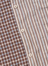 Close-up of the Brown Madison Check/Stripe Station Shirt. Features a brown and blue check pattern on one side and brown, white, and blue stripes on the other. White buttons are visible.