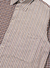 Close-up of the Brown Madison Check/Stripe Station Shirt. Features a brown and blue check pattern on one side and brown, white, and blue stripes on the other. White buttons. Pocket detail. 