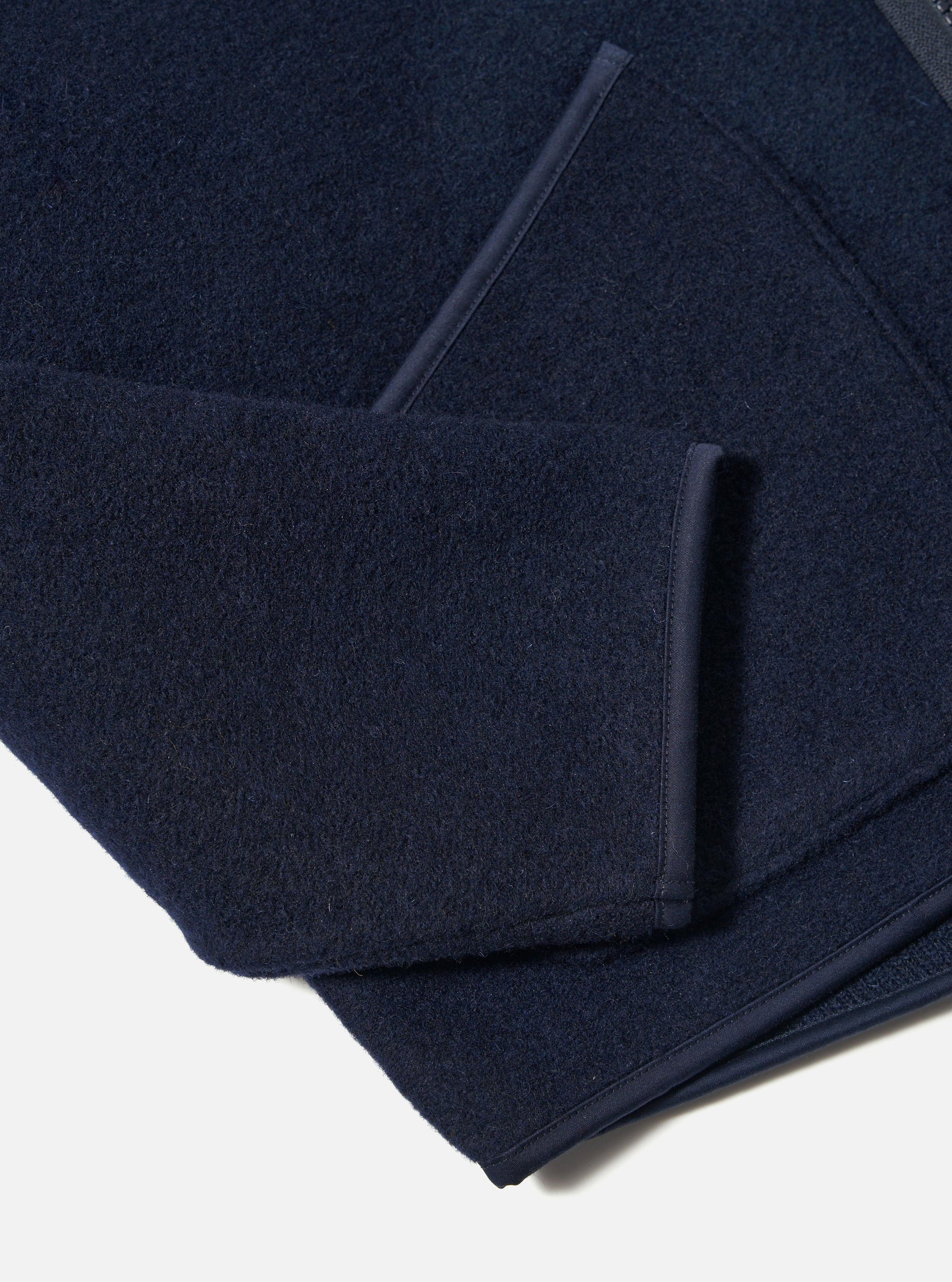 Close-up of the navy Techno Melton Plain Zip Liner Jacket showing the melton fabric and zip detail on a white background.