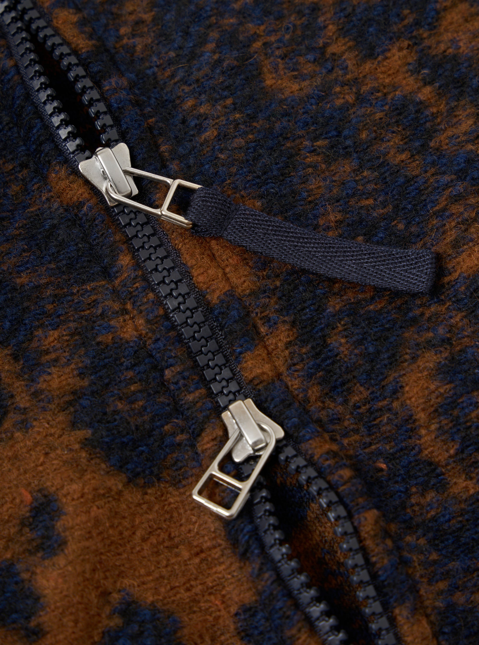 Close-up of the Dark Navy/Brown Night Leopard Zip Waistcoat, showing the zipper detail. The waistcoat features a unique leopard print in dark navy and brown hues.