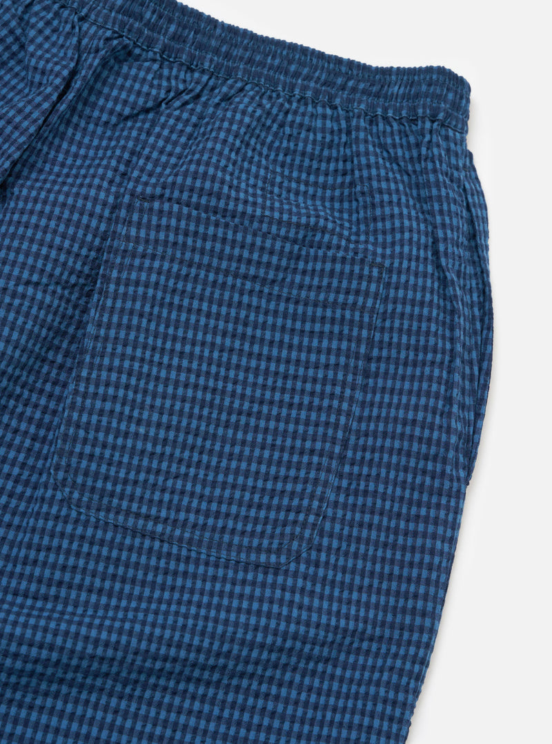Close-up of the Blue Gingham Seersucker Pyjama Short on a white background. Shows the elasticated waist and back pocket detail.
