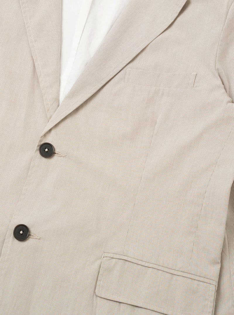 The Brown Kennedy Stripe Boston Blazer is shown from the back as a flat lay against a plain white background. The image highlights the clean lines of the rear panel, the vertical brown and cream stripes, and the simple construction of the shoulders and hem.