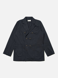 The Navy Twill Manor Jacket is presented as a flat lay against a plain white background. The jacket features a double-breasted front with six buttons, three of which are used for closure. It has two lower patch pockets, a welt chest pocket, and a notched lapel. The navy blue cotton twill fabric has a visible diagonal weave.
