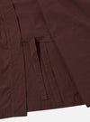 The Brown Peached Poplin Osaka Work Jacket is shown from the back as a flat lay against a plain white background. The image highlights the simple, clean construction of the garment's rear panel, the wrap-style kimono collar, and the soft, matte texture of the brown peached poplin fabric.