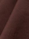 A close-up swatch image of the Brown Peached Poplin Osaka Work Jacket fabric displays a solid brown color with a soft, peached texture. The cotton poplin material fills the frame, highlighting the matte finish and fine weave.