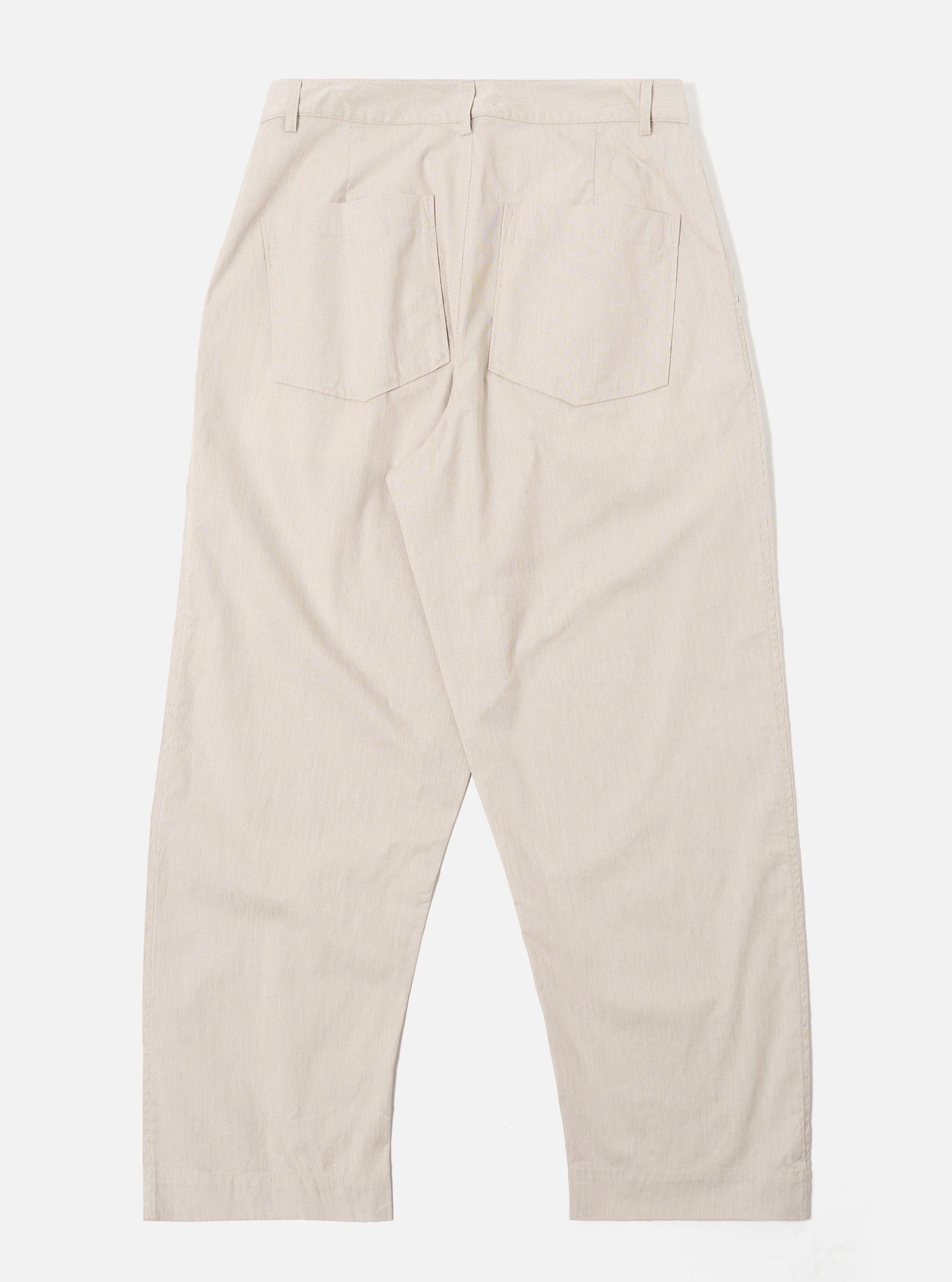 The Brown Kennedy Stripe Duke Pant is shown from the rear in a flat lay against a plain white background. The image highlights the two rear patch pockets, one with a button-down flap, and the elasticated waistband. The fabric features a distinct vertical brown and white stripe pattern.