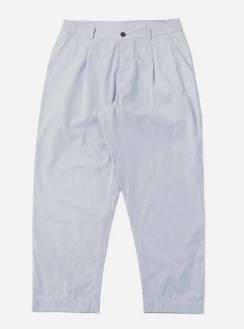 The Navy Kennedy Stripe Duke Pant is shown as a flat lay against a white background. These trousers feature a loose, wide-leg fit with a vertical pinstripe pattern throughout. The design includes a pleated front, a button-down fly, and belt loops at the waistband.