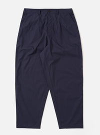 The Navy Peached Poplin Dutch Pant is shown as a flat lay against a white background. The trousers feature a loose, wide-leg fit with a drawstring elasticated waistband and two large front patch pockets. The peached poplin fabric has a smooth, matte finish.