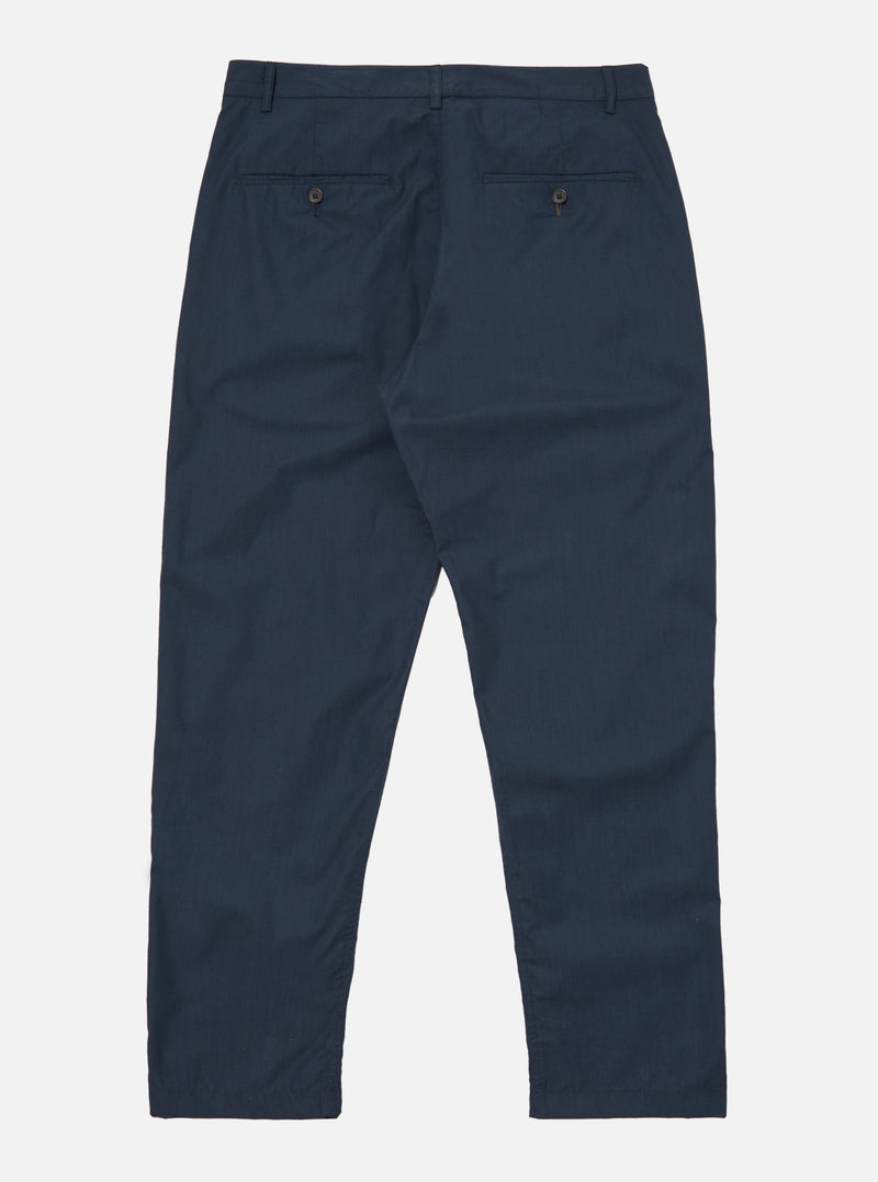 The Navy Recycled Polytech Military Chino is shown from the rear as a flat lay against a plain white background. The image highlights the two rear jetted pockets with button closures and a clean, straight waistband. The dark navy fabric has a smooth, technical finish.