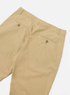 The Sand Recycled Polytech Military Chino is shown from a rear angle as a flat lay against a plain white background. The image highlights the two rear jetted pockets with button closures and the clean construction of the back of the trousers. The sand-colored fabric appears smooth and durable.