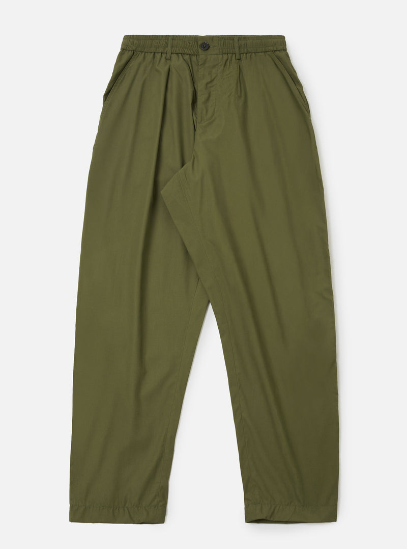 The Olive Recycled Polytech Pleated Track Pant is shown as a flat lay against a plain white background. The trousers feature an elasticated waistband with a contrasting off-white internal drawstring, a single front pleat on each leg, and two slanted side pockets. The fabric is a smooth olive green recycled poly-tech material with a tapered leg silhouette.