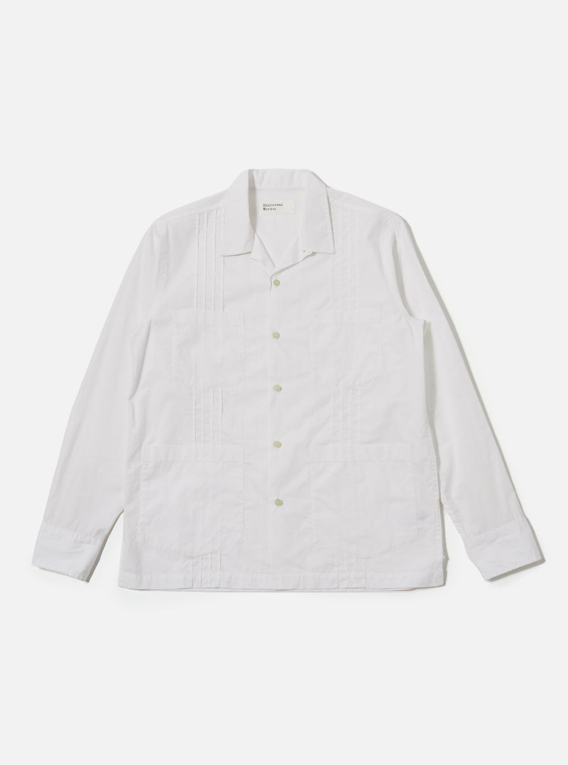 The White Poplin Dwight Overshirt is shown as a flat lay against a plain white background. The overshirt features a relaxed camp collar, a full button-front closure, and two large utility-style patch pockets on the chest. The fabric is a crisp white cotton poplin.