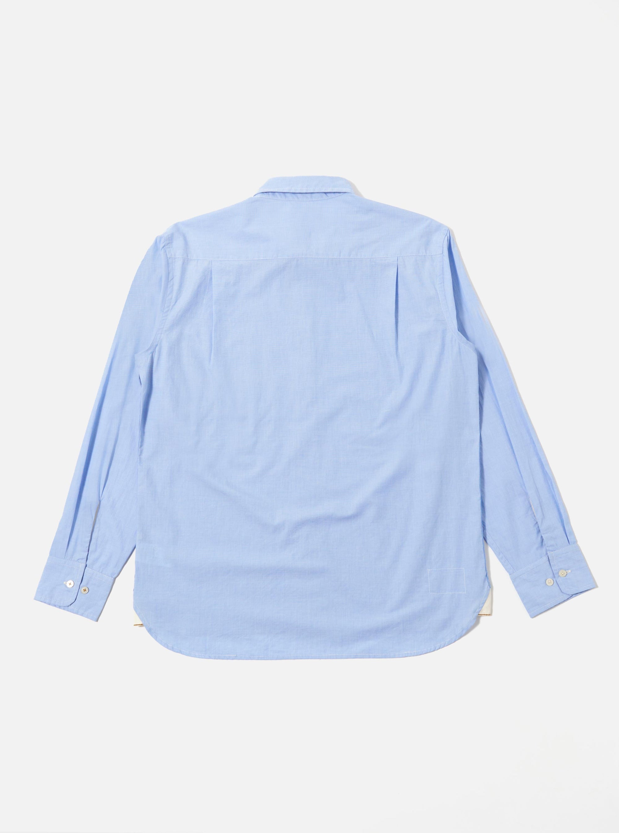 The Sky/Blue Fil A Fil Mixed Square Pocket Shirt is shown from the back as a flat lay against a plain white background. The image highlights the shirt's straight hem, structured collar, and the clean texture of the light blue fil-a-fil cotton fabric.
