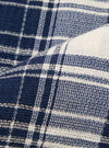 A close-up swatch image of the Navy Texture Plaid Zip Shirt fabric displays a deep navy blue and white checkered plaid pattern. The image highlights the intricate texture of the cotton fabric and the detailed weave of the plaid design.