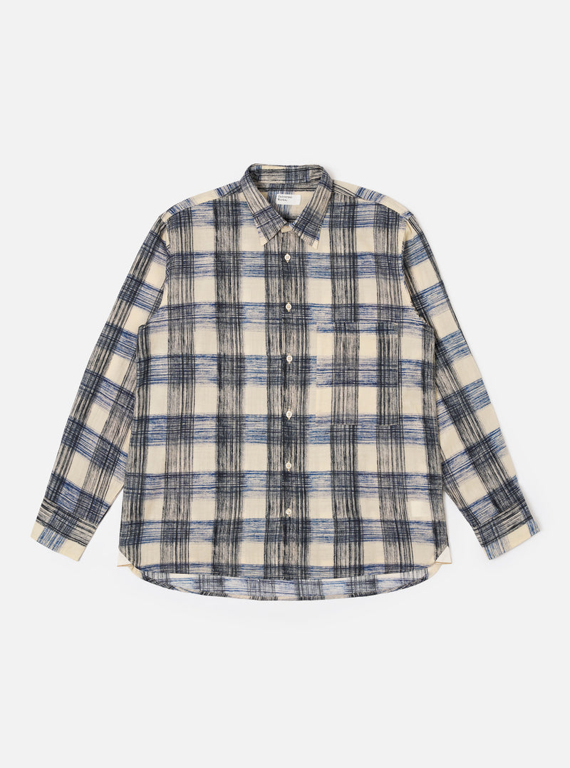 The Navy Window Panes Square Pocket Shirt is shown as a flat lay against a white background. The shirt features a dark navy cotton fabric with a white windowpane check pattern, a classic button-down front with tonal buttons, a pointed collar, and a large oversized square patch pocket on the left chest.