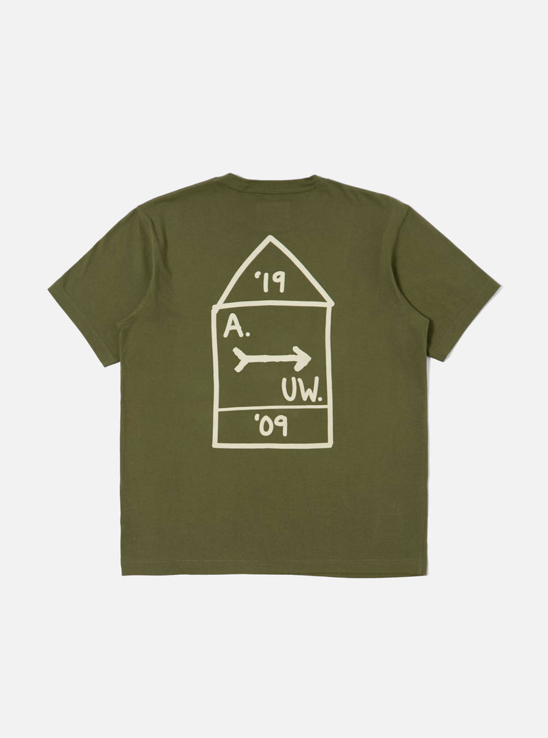 A. SOCIETY x Universal Works Olive Single Jersey Print Tee on a white background. The tee is olive with a white graphic on the back.