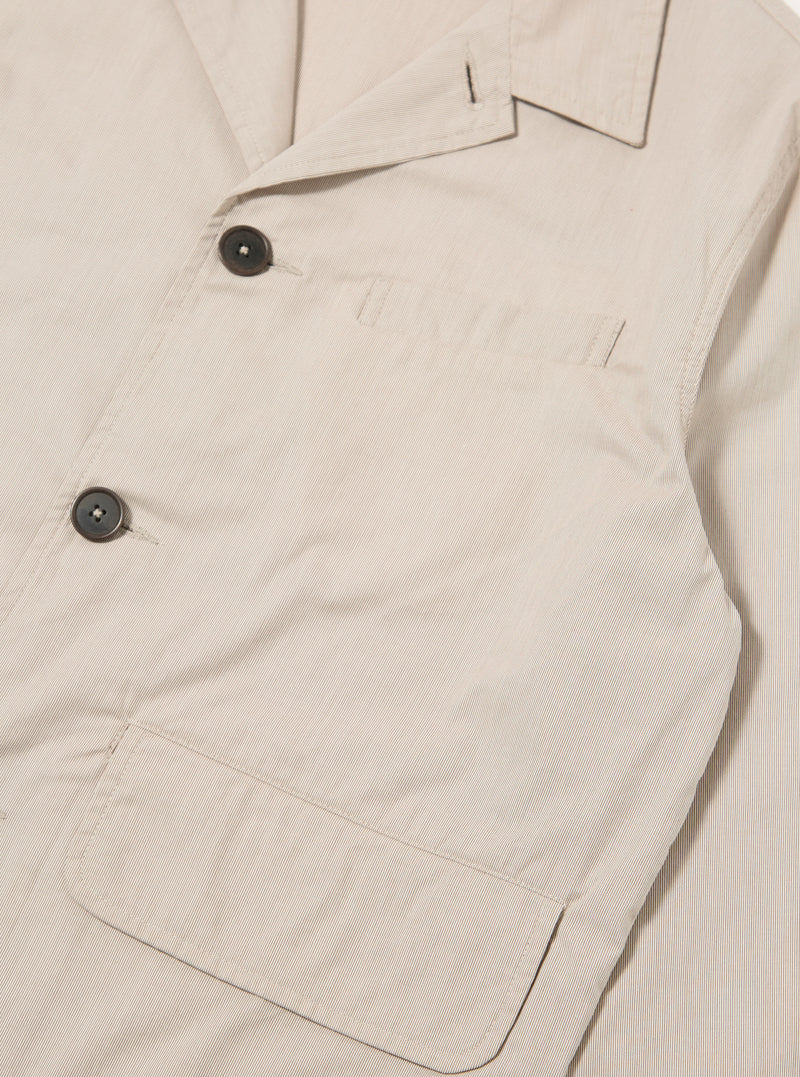 The Brown Kennedy Stripe Franck Jacket is shown from the back as a flat lay against a plain white background. The image highlights the horizontal stripe pattern, the straight hem, and the clean construction of the rear panel.