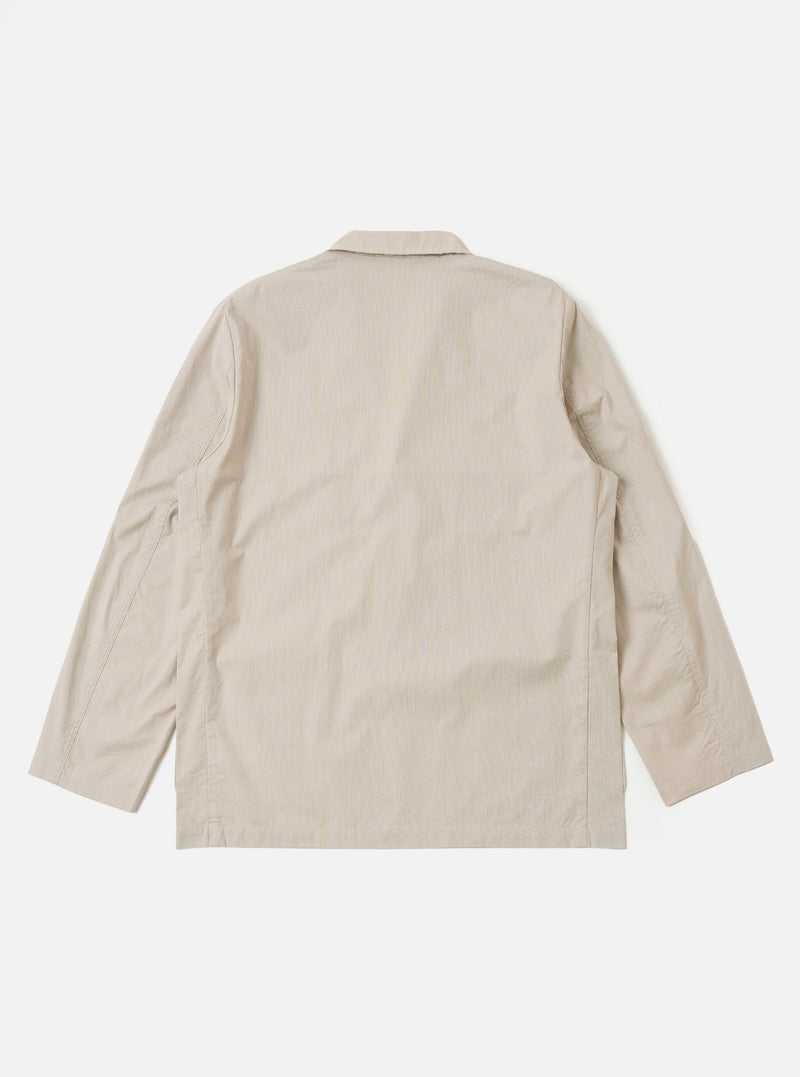 The Brown Kennedy Stripe Three Button Jacket is shown from the back as a flat lay against a plain white background. The image highlights the jacket's unstructured design, straight hem, and the subtle vertical Kennedy stripe pattern in brown.