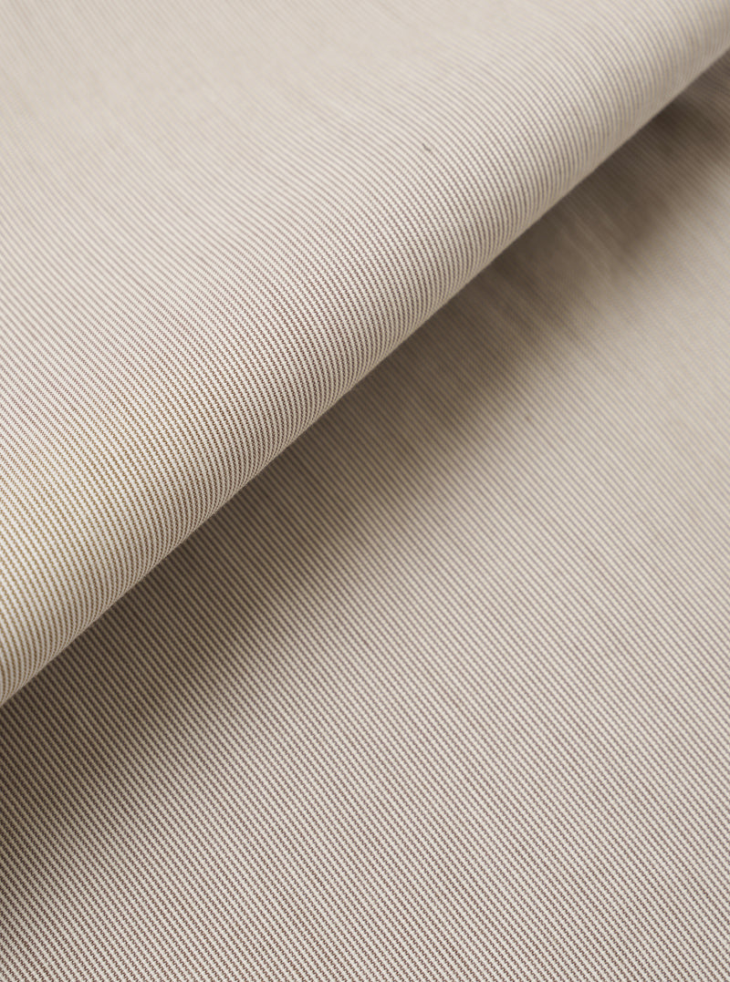 A close-up fabric swatch of the Brown Kennedy Stripe Military Chino highlights the brown color and fine vertical stripe pattern of the cotton fabric. The material features a distinct weave, and the swatch fills the entire frame.
