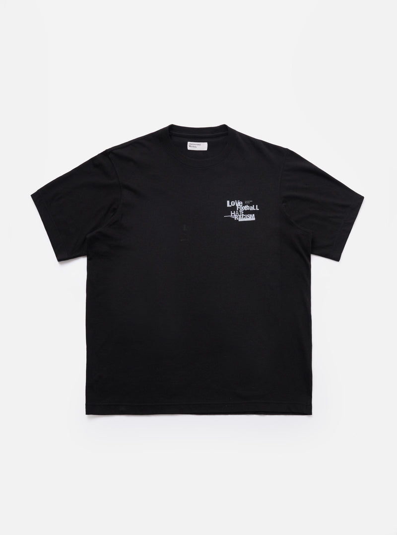 The Black Love Football Jersey Print Tee is shown as a flat lay against a white background. The t-shirt features a white graphic print on the center chest with the word Love written in a stylized, athletic-style font. It has a classic crew neckline and short sleeves.