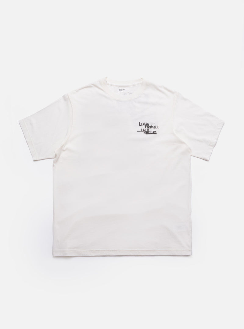 The Ecru Love Football Jersey Print Tee is shown as a flat lay against a plain white background. The t-shirt is a light cream color and features a large, stylized Love graphic printed on the chest in a contrasting dark color. The garment has a classic crew neckline and short sleeves.