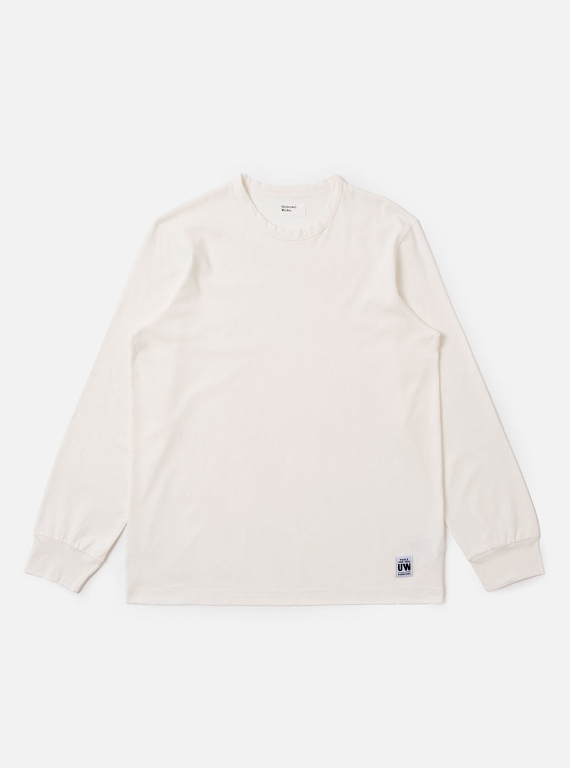 The Antique White Recycled/Bio Jersey Henry L/S Tee is shown as a flat lay against a white background. The long-sleeve T-shirt features a henley-style neckline with a three-button placket and ribbed cuffs. The fabric is a solid antique white jersey with a soft, matte finish.