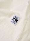 The Antique White Recycled/Bio Jersey Core Pocket Tee is shown from a rear angle as a flat lay against a plain white background. The image highlights the clean, simple construction of the t-shirt's back, featuring a straight hem and short sleeves. The fabric is a solid antique white jersey with a smooth texture.
