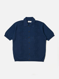 The Dark Navy Cotton Lace Knit Jonny Knit Shirt is shown as a flat lay against a white background. The shirt features a full-button front, a classic pointed collar, and short sleeves. The garment is characterized by its intricate, open-work lace knit texture in a deep navy blue.