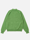 The Green Eco Cotton Knit Pocket David Cardigan is shown from the back as a flat lay against a plain white background. The image highlights the raglan sleeve construction, ribbed cuffs, and a ribbed hem. The garment is made from a chunky green recycled cotton knit.