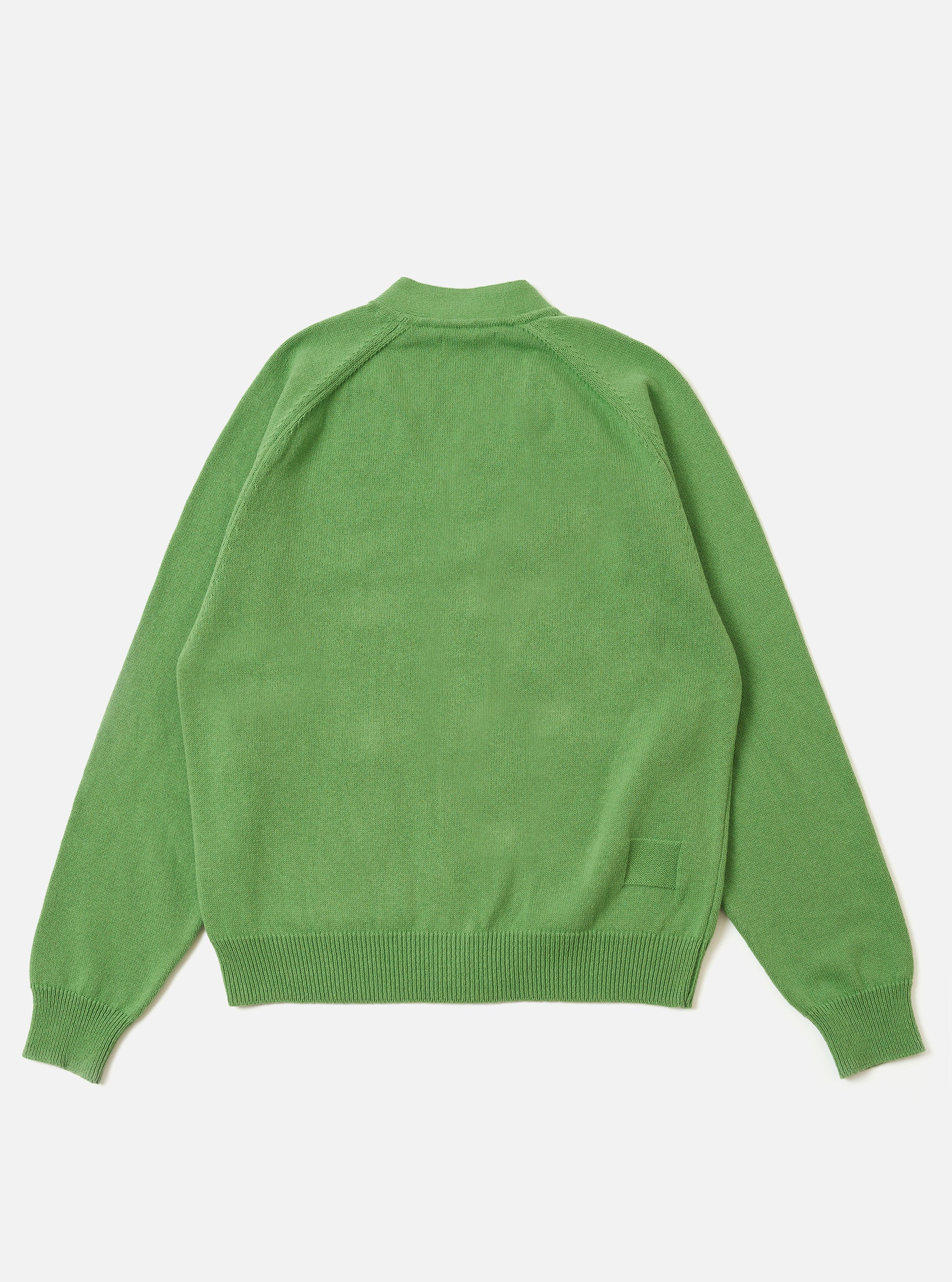 The Green Eco Cotton Knit Pocket David Cardigan is shown from the back as a flat lay against a plain white background. The image highlights the raglan sleeve construction, ribbed cuffs, and a ribbed hem. The garment is made from a chunky green recycled cotton knit.