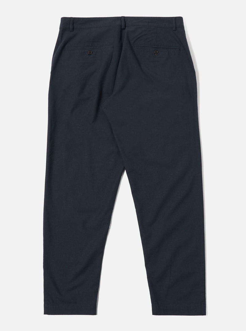 The Navy Valencia Cotton Military Chino is shown from the back as a flat lay against a plain white background. The image highlights the two rear pockets, the waistband with belt loops, and the straight-leg cut. The dark navy fabric has a subtle textured appearance.