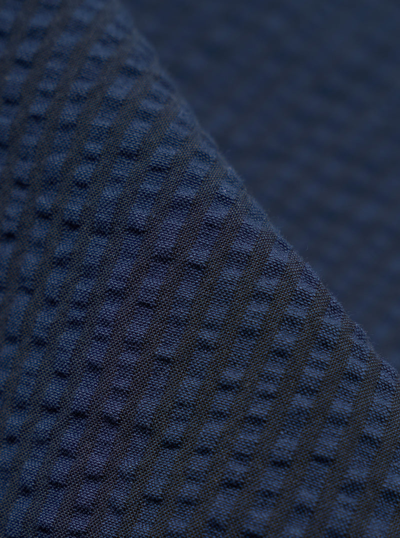 A close-up swatch image of the Navy Derby Stripe Duke Pant fabric displays a deep navy blue color with a distinct vertical derby stripe pattern. The texture of the cotton material is clearly visible, highlighting the weave of the fabric.