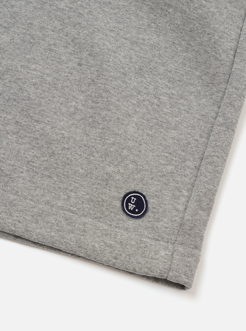The Grey Marl Recycled Cotton Blend Jersey Vacation Short is shown from the back as a flat lay against a plain white background. The shorts feature an elasticated waistband and a single patch pocket on the right rear side. The fabric has a soft, heathered grey marl jersey texture.