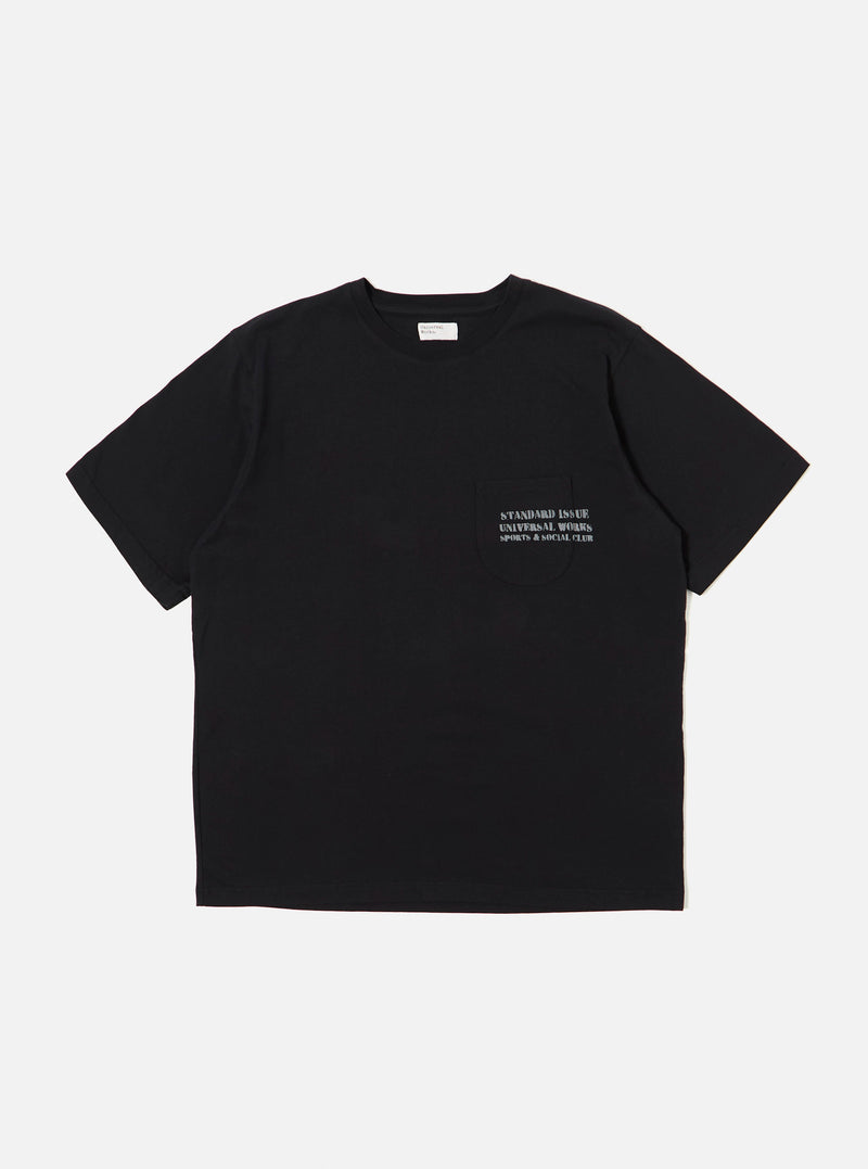 The Black Organic Jersey Print Pocket Tee is displayed as a flat lay against a plain white background. The T-shirt features a classic crew neckline, short sleeves, and a single patch pocket on the left chest area featuring a graphic print. The garment is made from a solid black organic cotton jersey fabric.