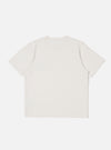 The Ecru Organic Jersey Print Pocket Tee is shown from the back as a flat lay against a plain white background. The image highlights the clean construction, straight hem, and the soft, off-white texture of the organic cotton jersey fabric.