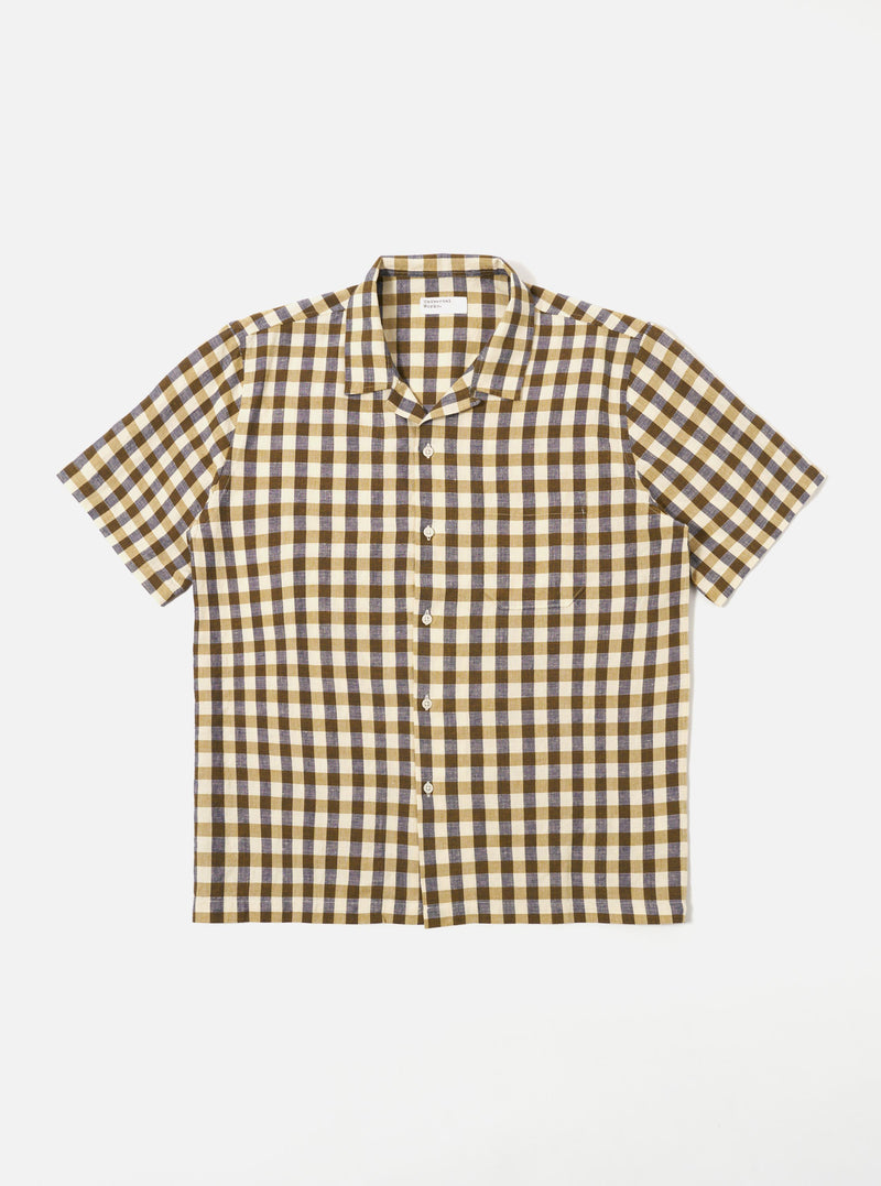 The Olive Aberdeen Lincot Road Shirt is shown as a flat lay against a plain white background. The shirt features a camp collar, a six-button front closure, and two large patch pockets at the waist. The garment is made from a blended cotton and linen fabric in a solid olive green color.