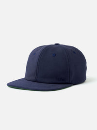 The Navy Canvas Baseball Hat is shown as a flat lay against a plain white background. The hat features a classic six-panel construction, a curved brim, and a matching top button. The navy blue cotton canvas fabric has a durable, matte appearance.