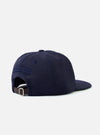 The Navy Canvas Baseball Hat is shown from the back in a detailed view against a white background. The image highlights the adjustable strap with a metal buckle and the signature fabric loop.