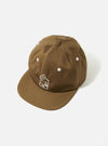 A. SOCIETY x Universal Works Olive Twill Cotton Baseball Hat on a white background. The olive hat features white embroidered details and a classic fit.