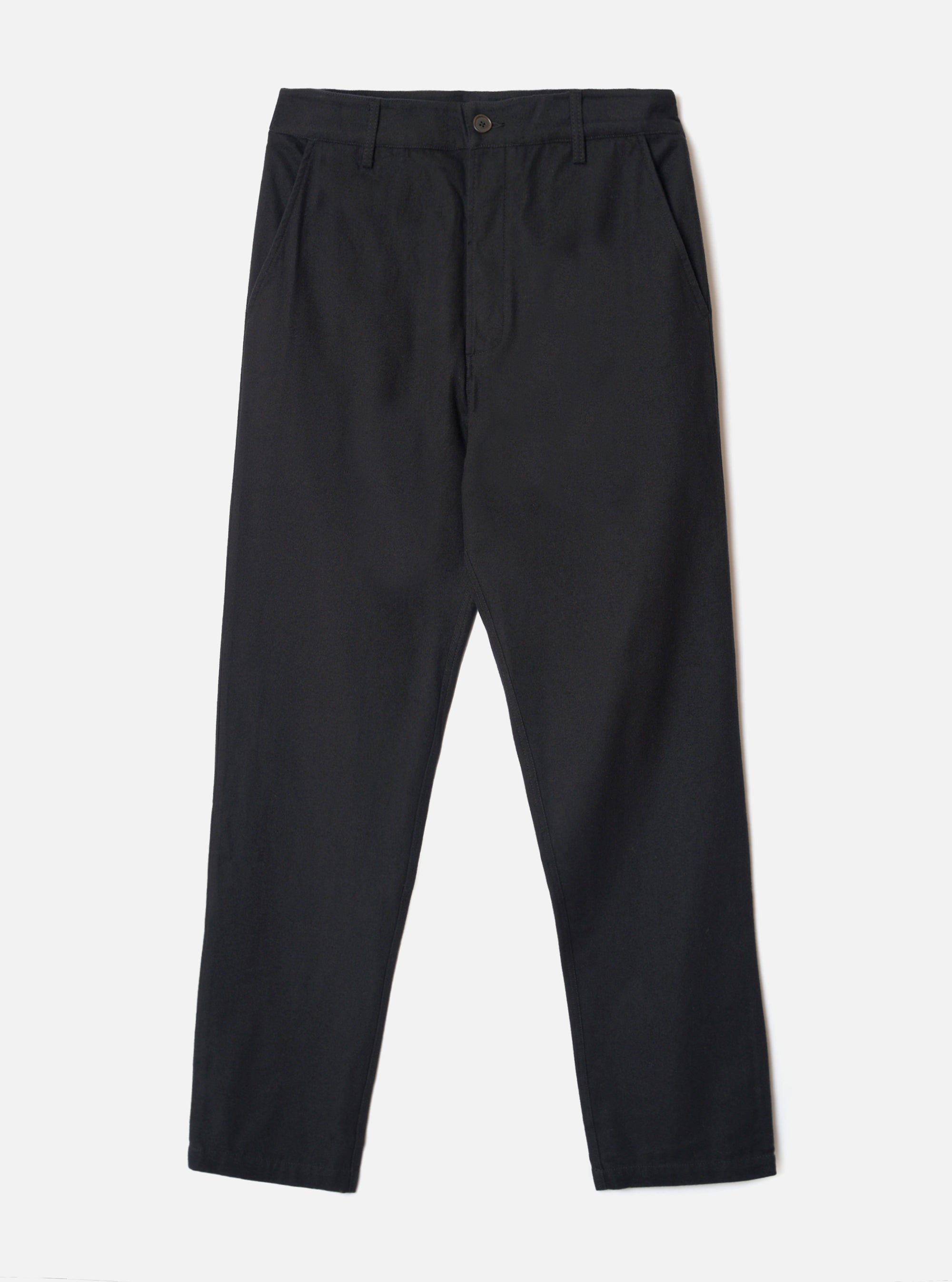 Black brushed moleskin military chinos laid flat on a light grey studio backdrop. The waistband features belt loops and a single dark button fastening at the centre front. Slant side pockets sit at the hips. The fabric has a subtle brushed texture. The trousers taper slightly from a relaxed thigh to a narrower ankle hem.