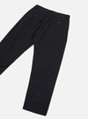 Black brushed moleskin military chino laid flat on a white studio surface, showing the back. Smooth, matte fabric with a structured waistband, belt loops, and two button-fastened welt pockets. Slim tapered leg with a clean unrolled hem. Cropped above the waistband.