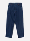Indigo work denim super chino laid flat on a light grey studio backdrop. Dark indigo denim with a wide, tapered leg and single pleat at each hip. Structured waistband with a single button fastening, belt loops, and angled side pockets. Cuffed hems. Contrast topstitching throughout.