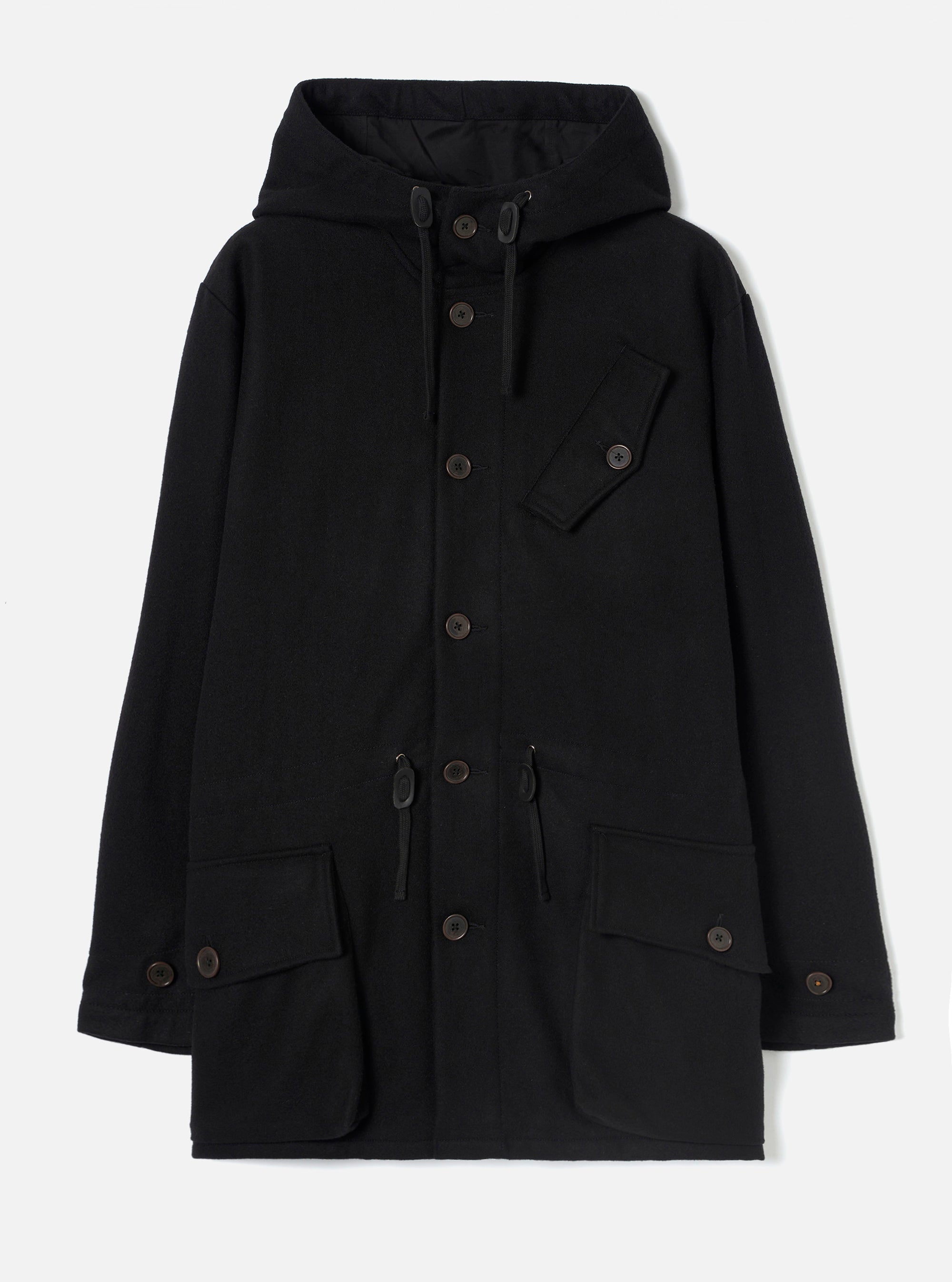 Black wool-blend Mowbray Boston Parka on a plain light grey studio backdrop, no model. Large hood with black drawcord, button-through front placket, chest patch pocket, two large flap patch pockets at the hem, waist drawcord, and button-tab cuffs. Smooth, dense fabric texture throughout.