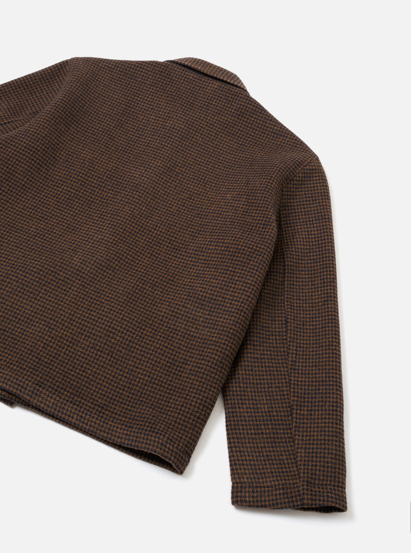 A studio rear view of the Navy/Brown Wool Tweed Mix Franck Jacket on a neutral background. The shot highlights the clean back yoke, straight hem, long sleeves, and textured navy and brown wool tweed blend material.