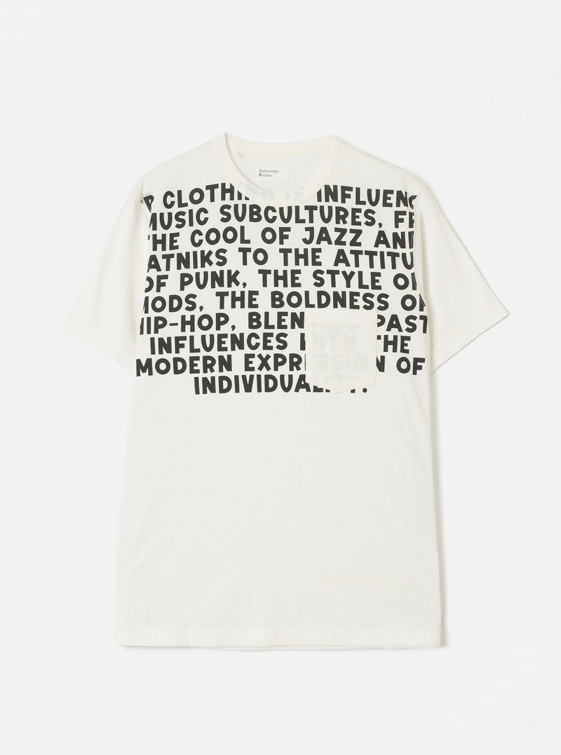 Ecru single jersey pocket tee laid flat on a light grey seamless backdrop. A bold black all-caps text graphic covers the chest, referencing music subcultures including jazz, punk, mods and hip-hop. A small patch chest pocket sits within the graphic. Crew neck, short sleeves and a Universal Works neck label visible.