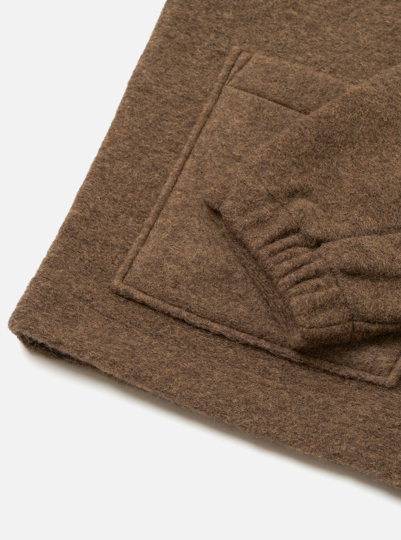 A close-up view of the front of the Brown Marl Wool Fleece Rams Jacket on a plain background, showcasing the neat point collar, button fastening, drop shoulder seam, and soft wool-fleece fabric detail.