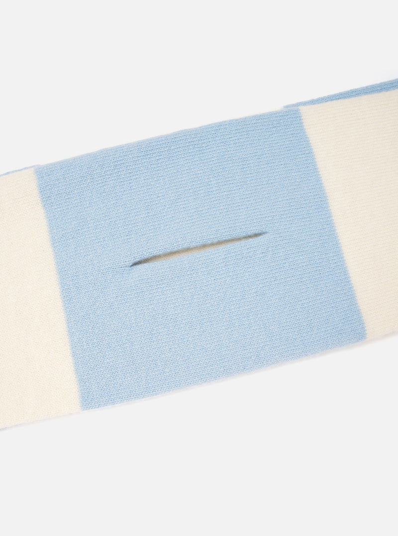 A close-up detail shot of the Ecru/Sky Soft Wool Deluxe Football Scarf against a white background. The focus is on the fine knitted weave of the soft wool material, contrasting color bands, and fringe detailing along the border.