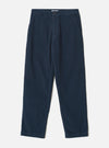 Dark navy corduroy military chino trousers laid flat on a light grey seamless backdrop. Wide-wale cord fabric with vertical ribbing throughout. Structured waistband with a single button fastening, belt loops, and slanted side pockets. Relaxed straight leg with a plain, unfinished hem.